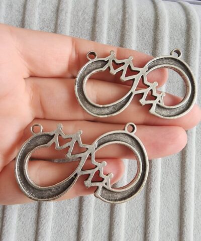 El Ele Sonsuzluk Dokum Kolye Ucu 2